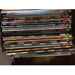 A box containing a large selection of Uncut Music Magazines