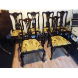 A set of six Georgian style 1930's Dinning chairs including two carvers with pop out seats.