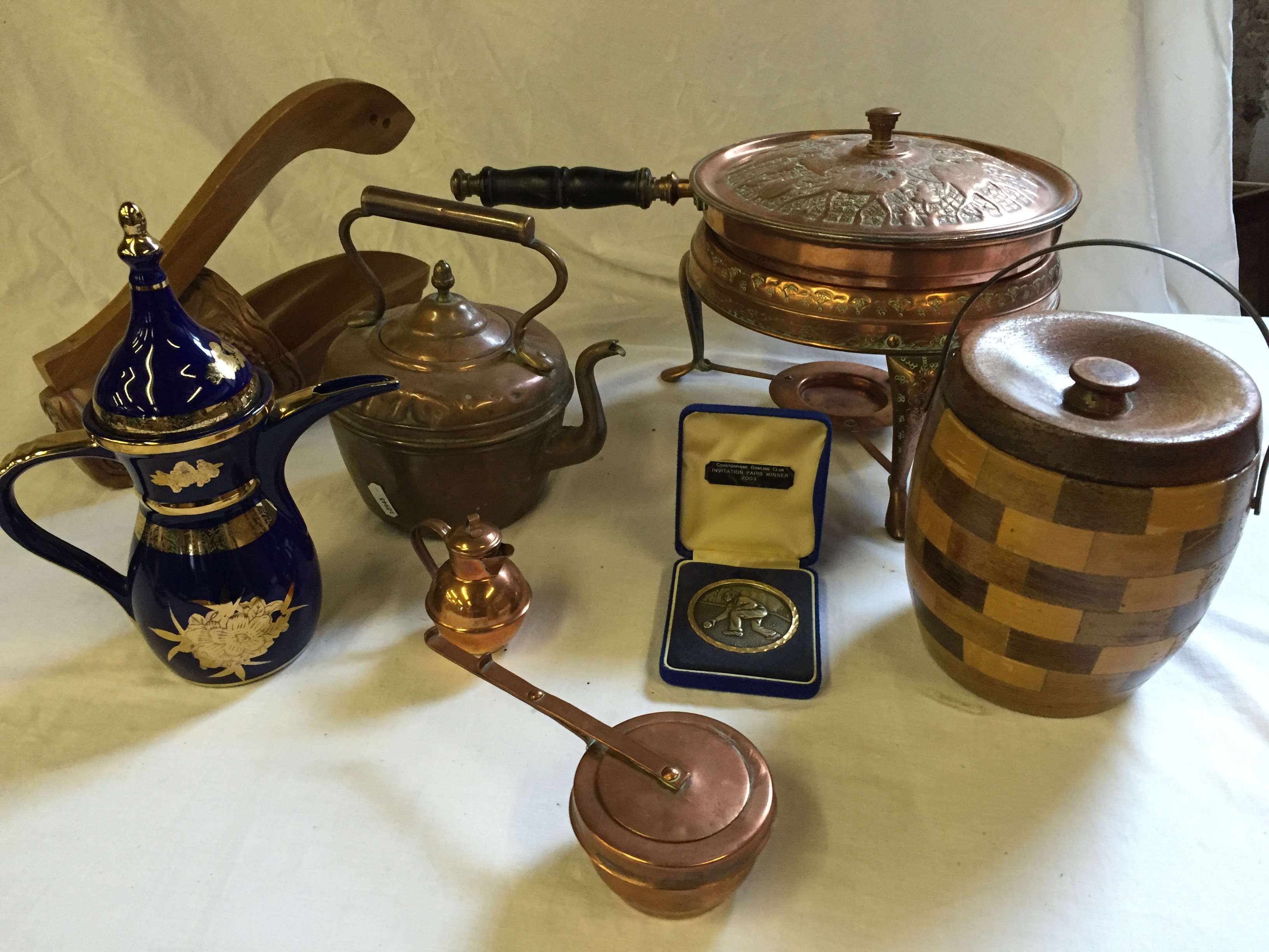 A copper warming pan, kettle a treen biscuit barell and others.