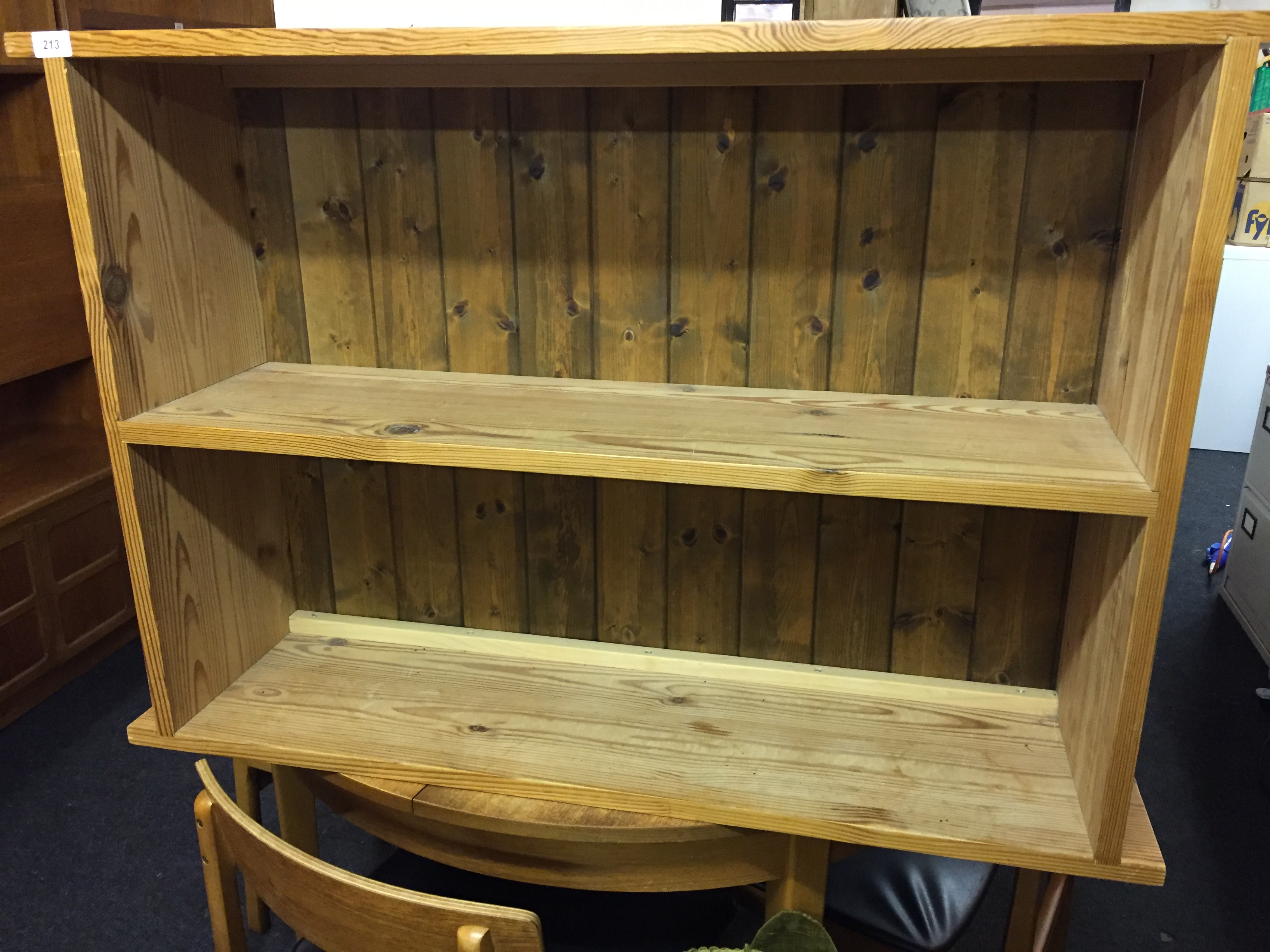 A two shelf pine bookcase.