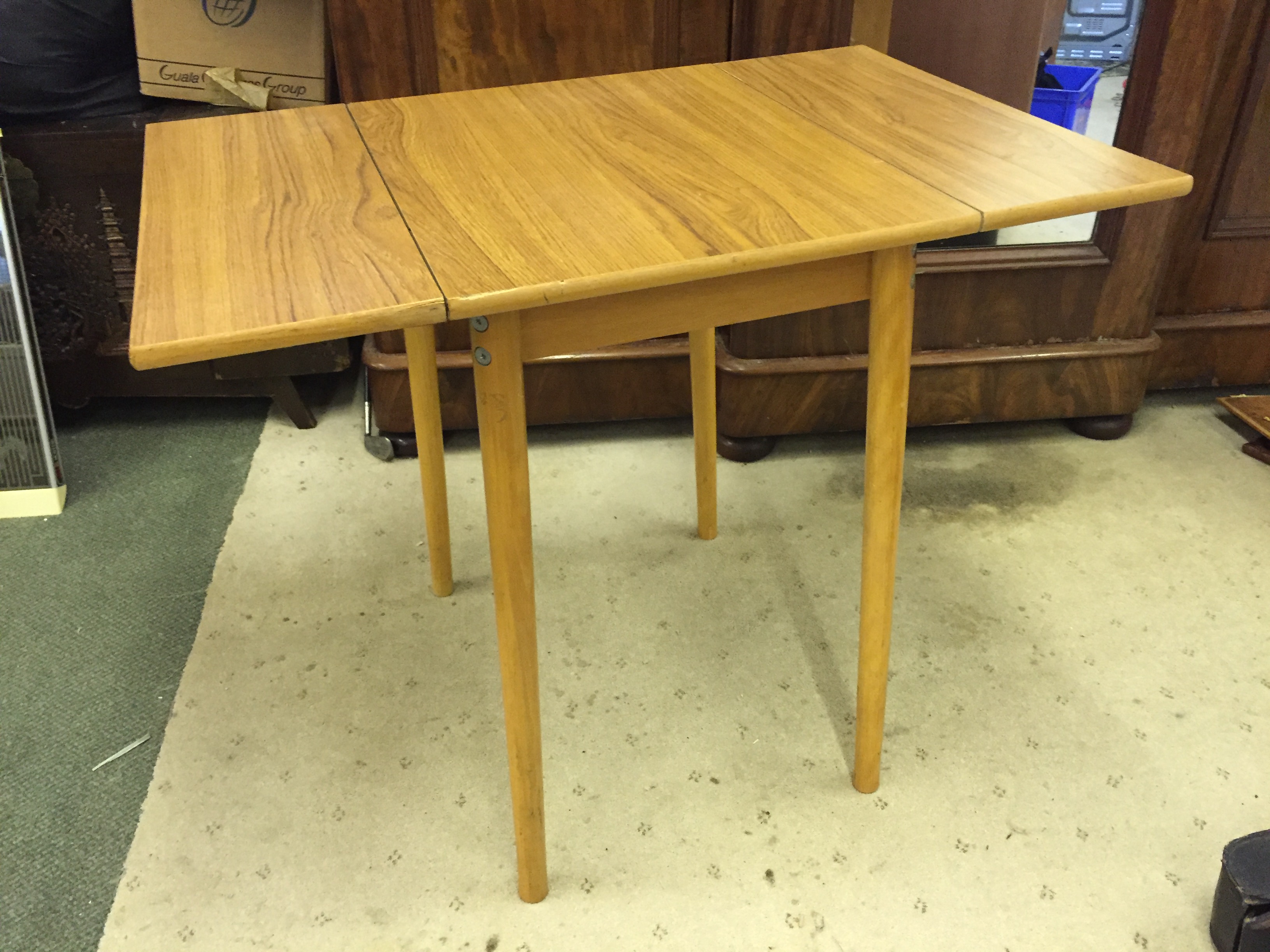 A formica Pembroke style table.