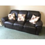 A leather Three seater settee.