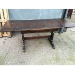 A dark wood extending table 730 mm x 710 mm 1140 mm (Showroom 2)