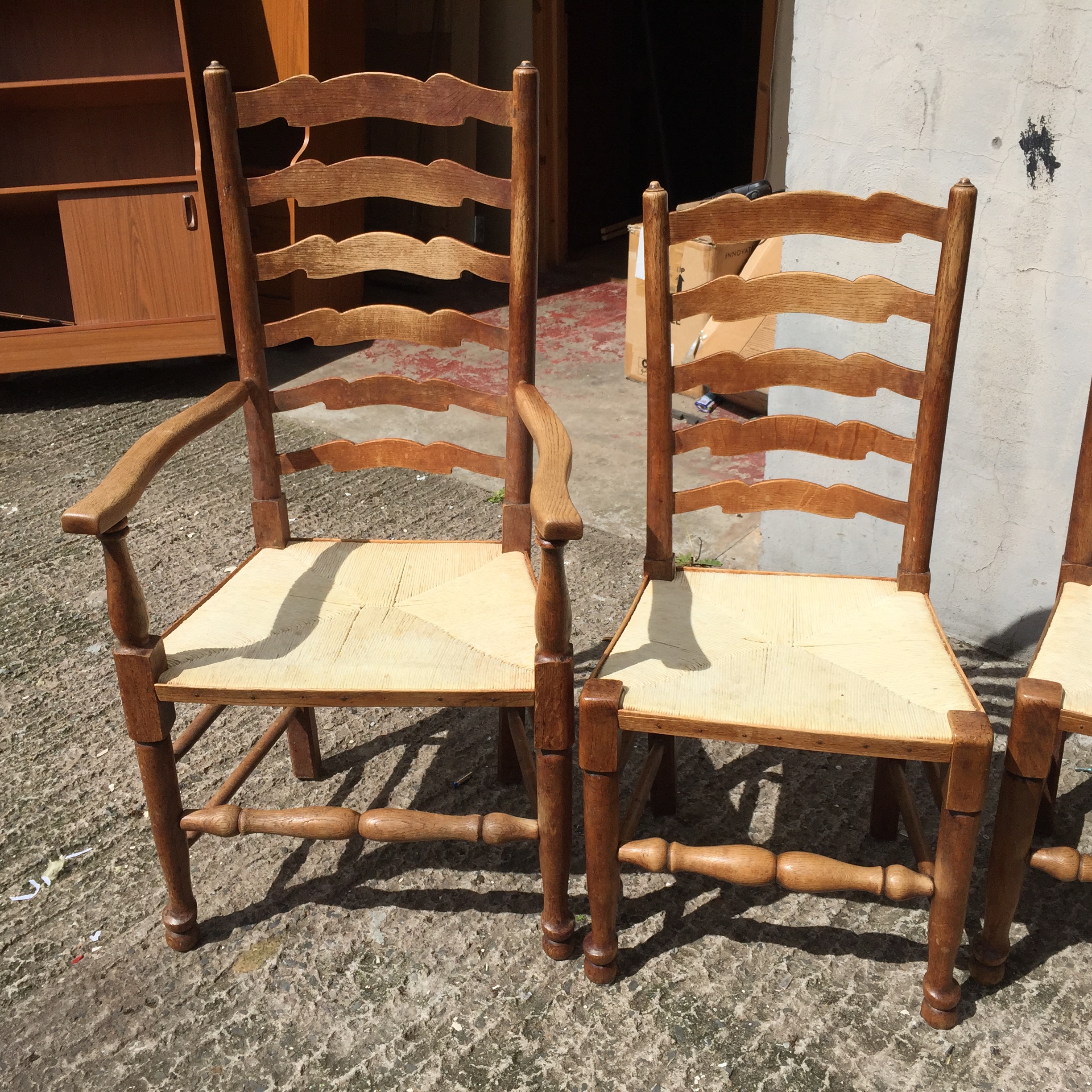 *A set of six oak ladder back dining chairs with rush seats two newly refurbished. - Image 3 of 3