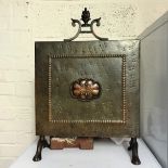 An Arts and crafts brass and copper fire screen.