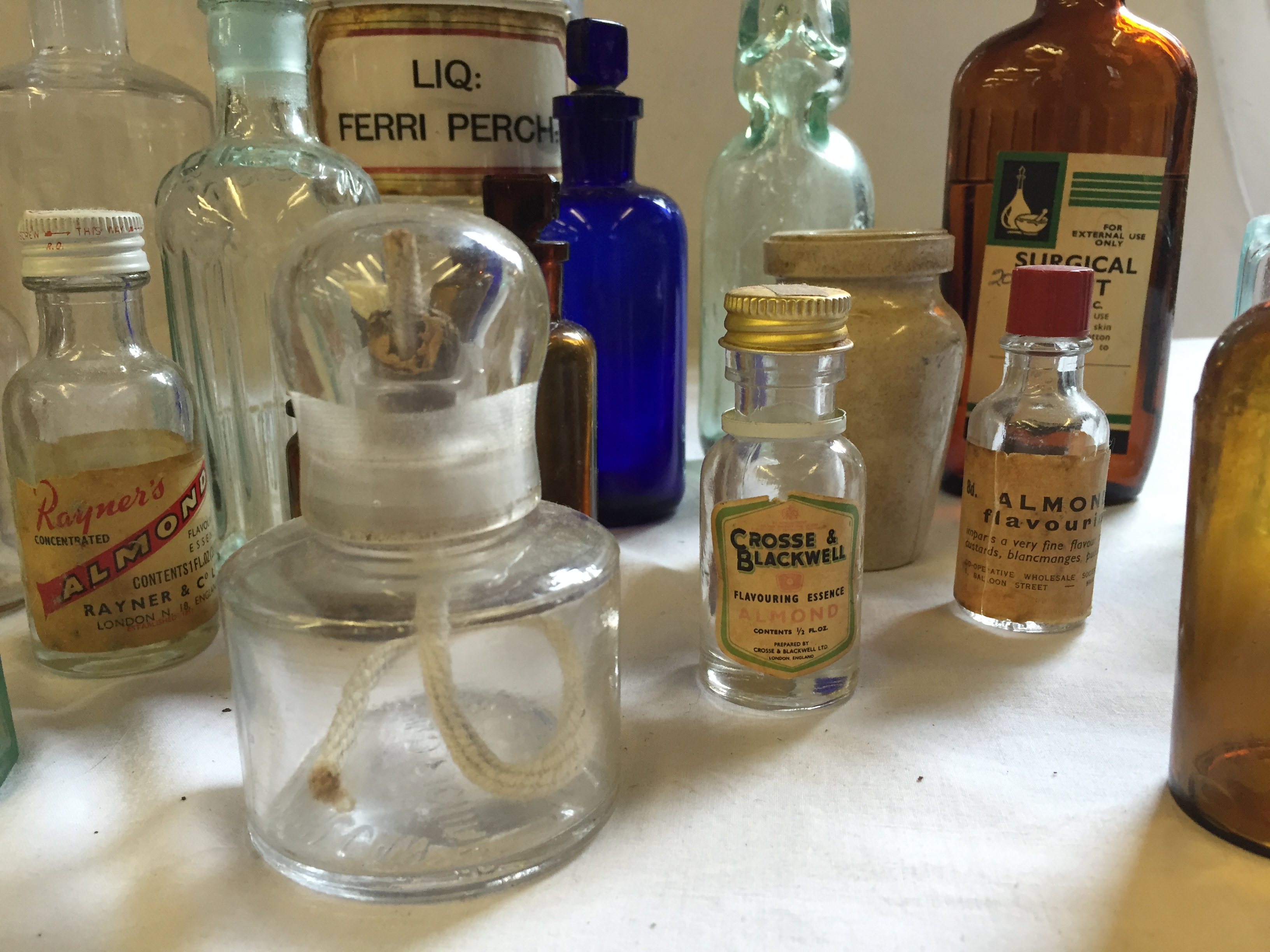 Twenty one glass bottles including clear chemist bottle, blue glass and brown. - Image 3 of 3