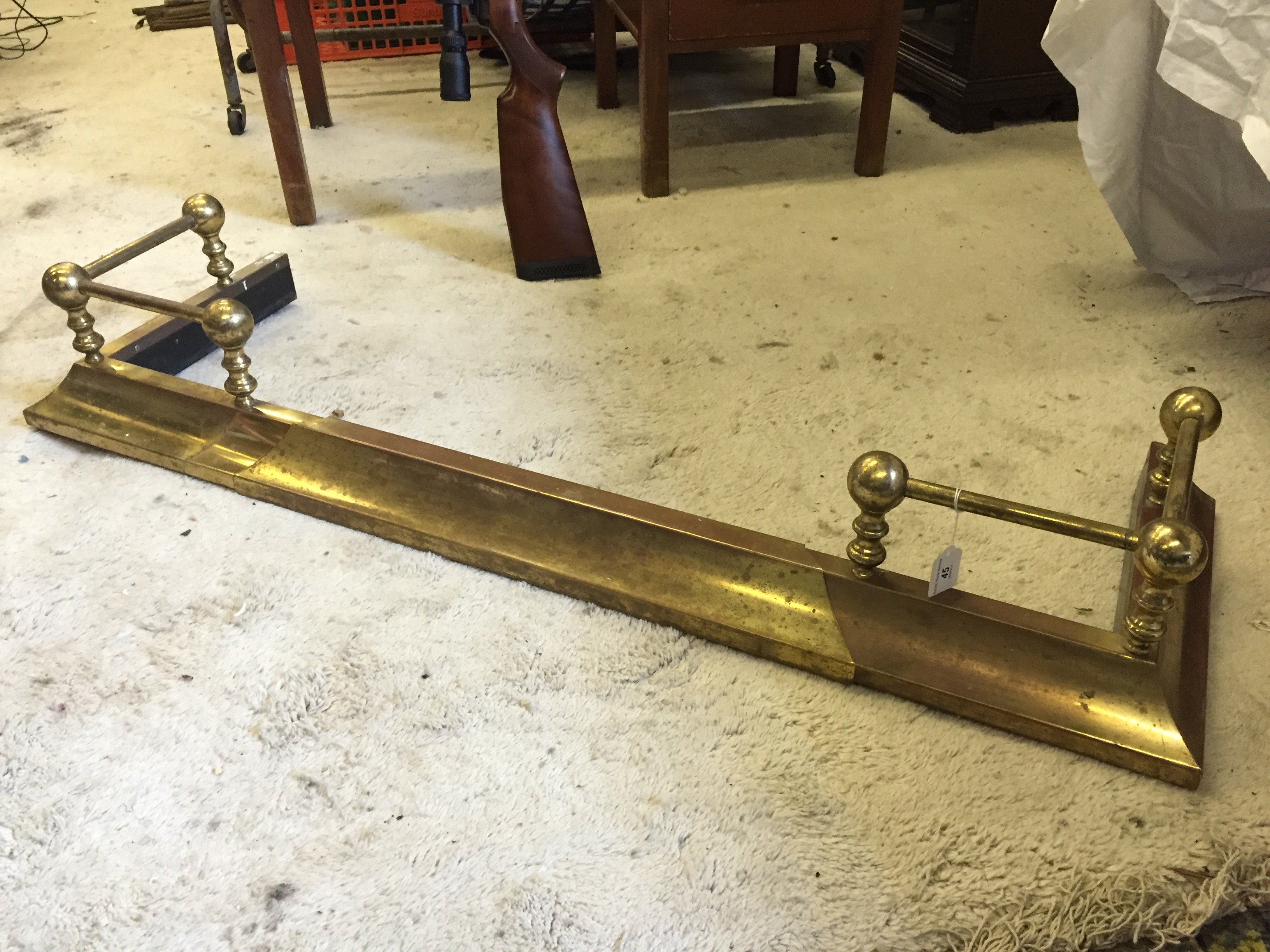 An extending brass fender.