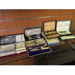 Various boxed flatware and silver plate.