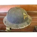 A World War 2 Air raid shelter helmet.