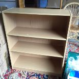 A three shelf bookcase. (Showroom 2)