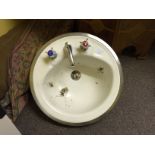 An enamel sink. (Showroom 2)