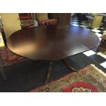An extending dining table by Beresford &
