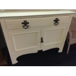 A Victorian mirror backed sideboard with long drawer over two cupboards below.