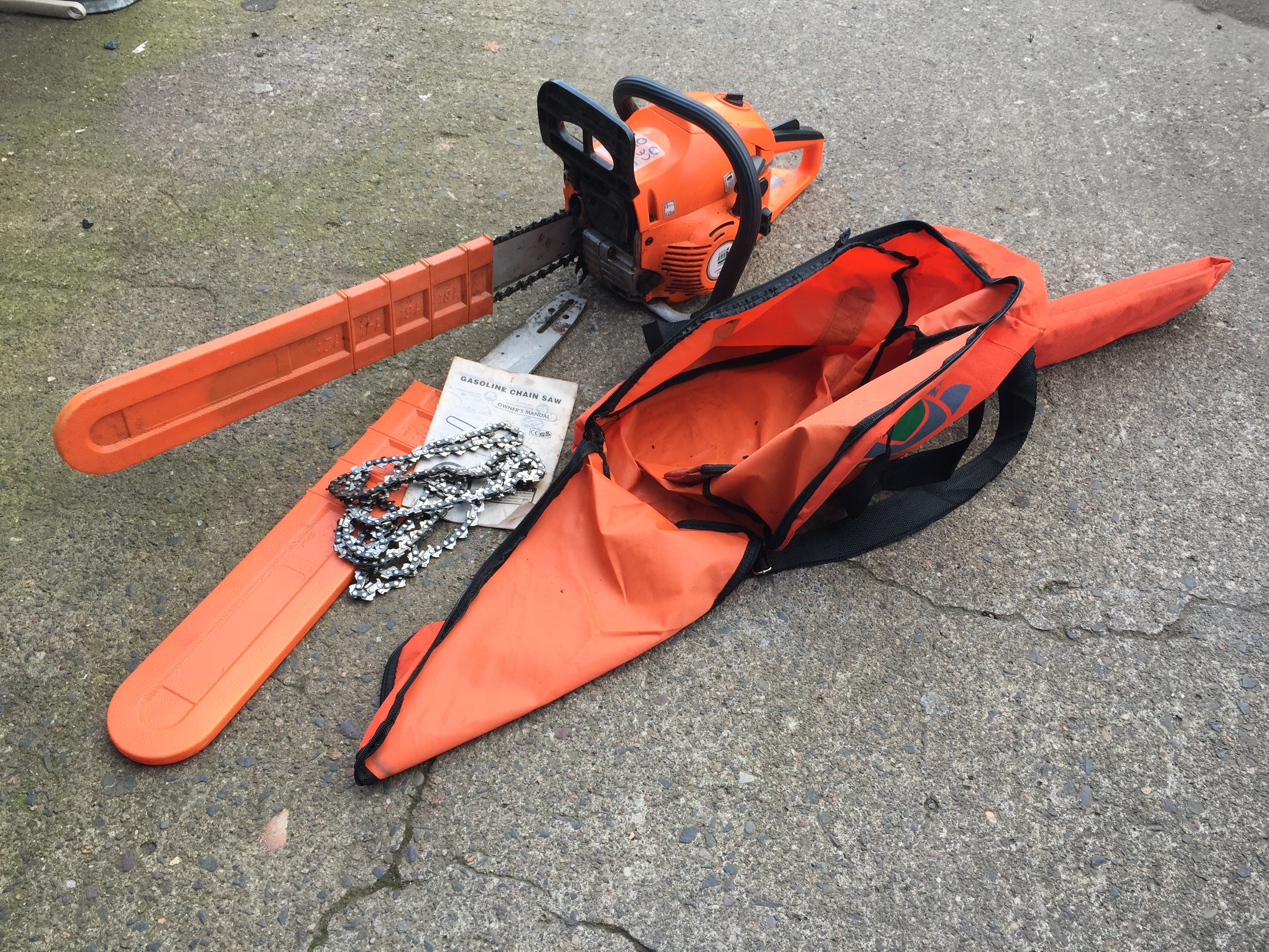 Chain saw with spare bar and two spare chains. - Image 6 of 6