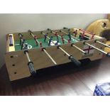 A fooseball football table.