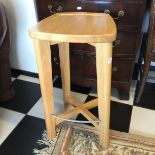 A pine bar stool.