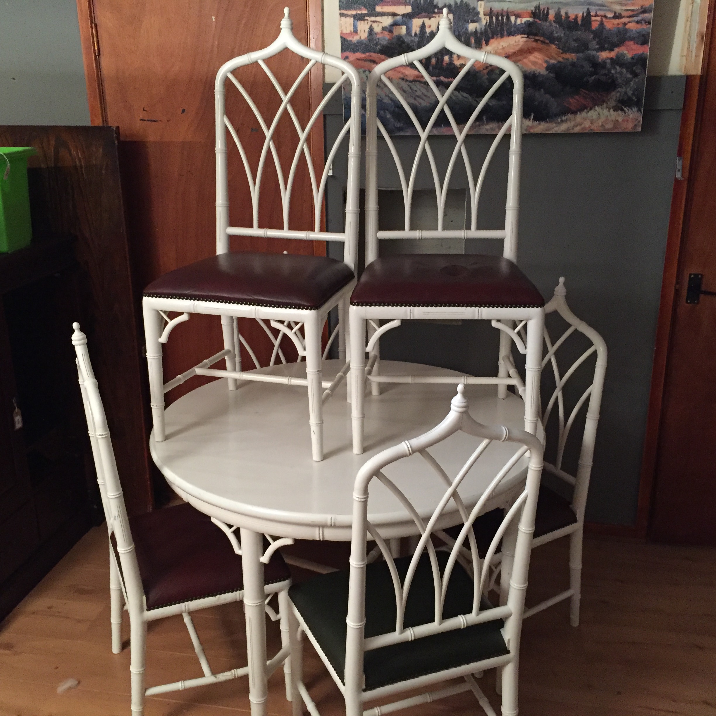 A circular extending dining table and six cane cathedral back chairs. - Image 4 of 4