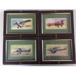 Four framed vintage plane prints.