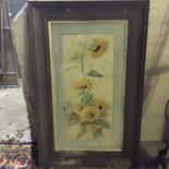 A framed watercolour of sunflowers signed Mary Bea