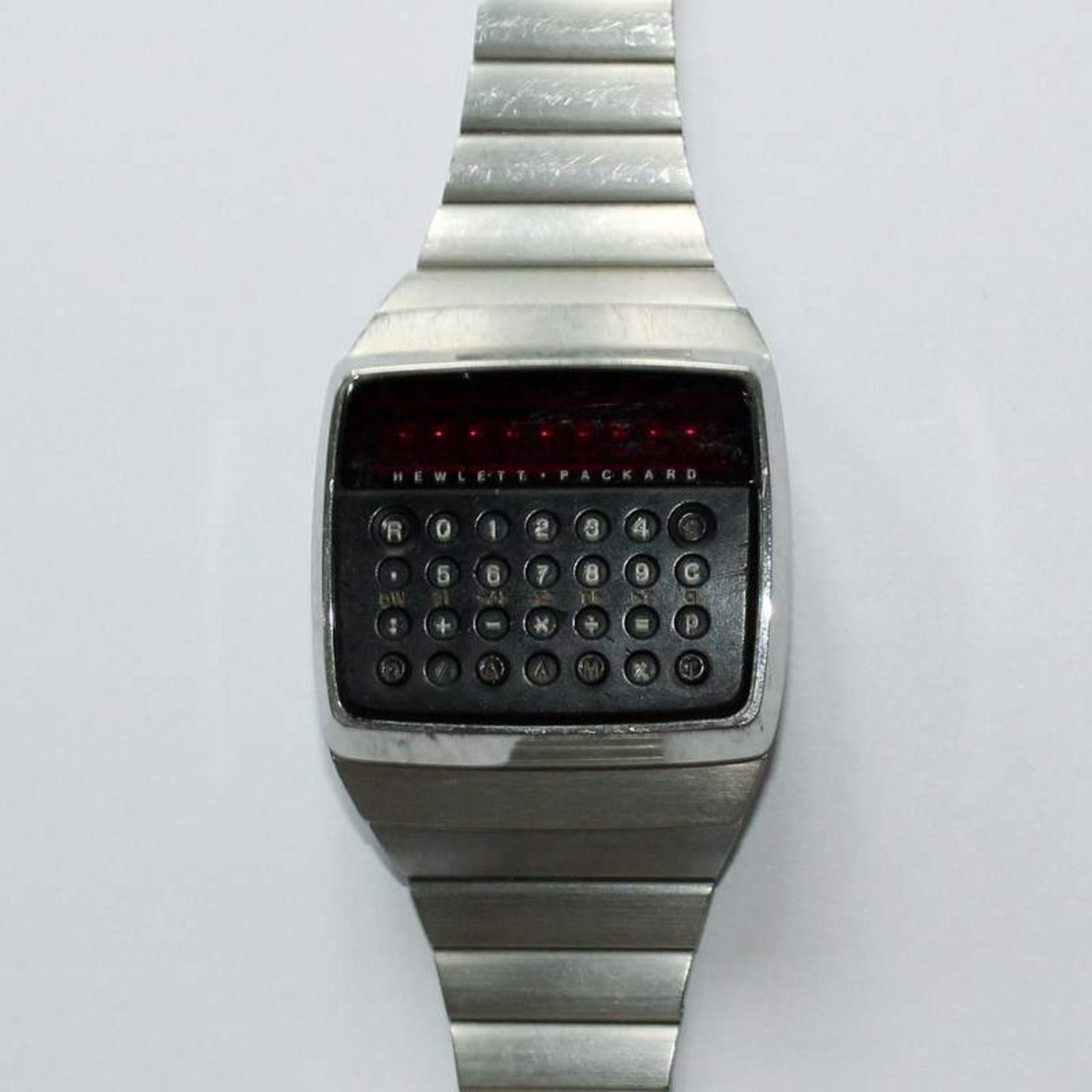 Herrenarmbanduhr - Hewlett Packard um 1977, Schweiz, Taschenrechneruhr, rechteckiges Gehäuse, ca.3,5