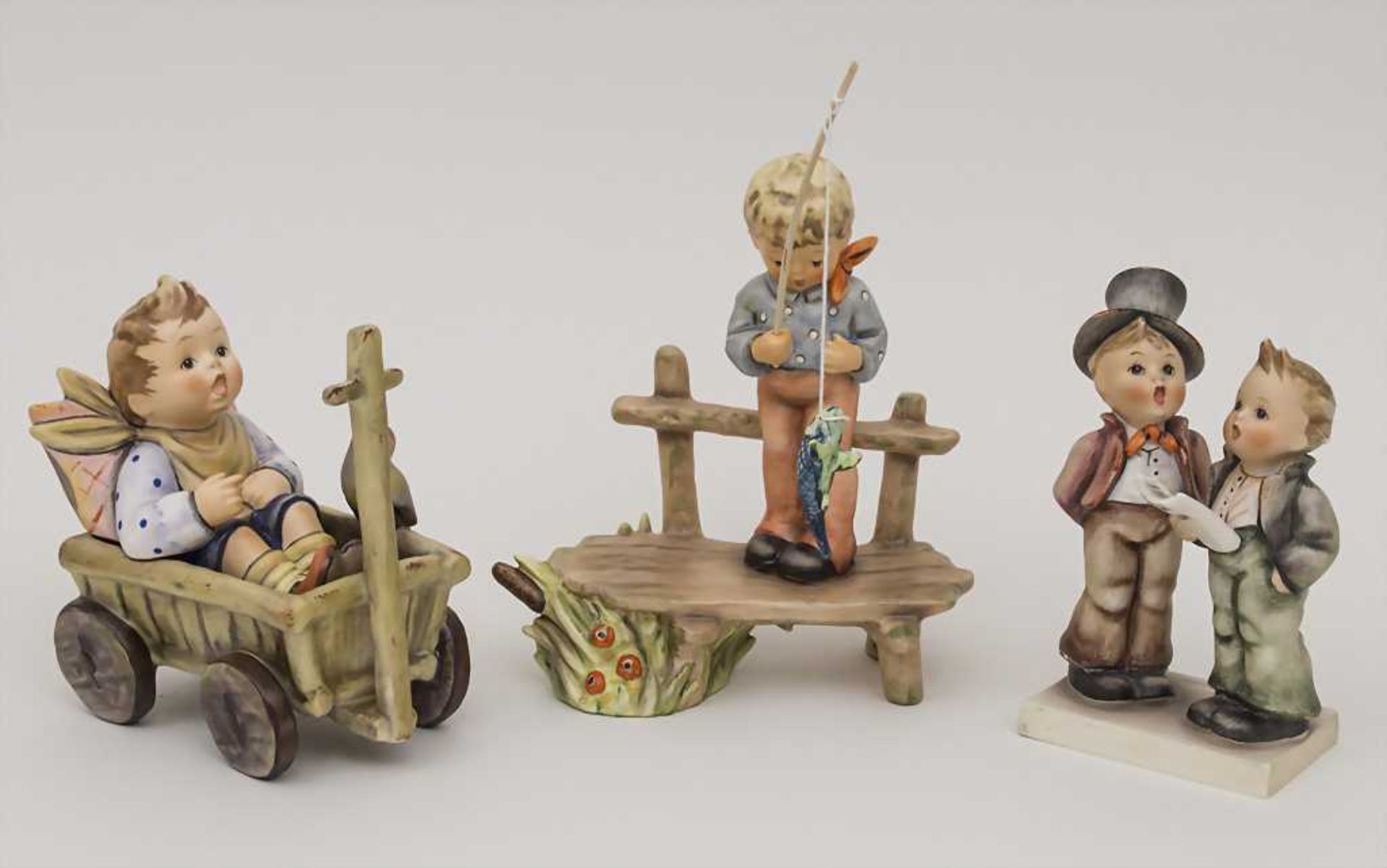 Lot 3 Hummel-Figuren / Hummel Figurines, Goebel, Oeslau, 20. Jh. Material: Steingut, farbig