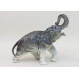 Elefantenfigur mit erhobenem Rüssel, unbekannt gemarkt, H. 24 cm