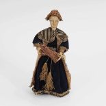 Krippenfigur: Frau mit Reisigbündel. Geschnitzter Kopf und Gliedmaßen je polychrom gefasst, Holz-