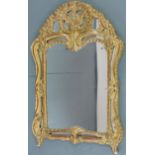 Spiegel mit barockem Rahmen.74 cm x 48 cm. Rahmen aus Holz, geschnitzt und vergoldet. Vergoldung