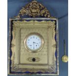 Wanduhr in Barock-Rahmen unter Glas.73 cm x 46 cm. Werk nicht bezeichnet.Wall Clock in baroque frame