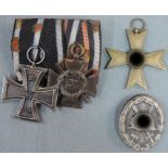 4 Orden, 1. und 2. Weltkrieg.Verdienstkreuz 1939. Eisernes Kreuz mit Band. Ehrenkreuz für