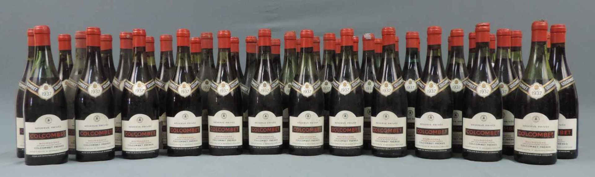 1937 Bourgogne AC von Colcombet Frères, caves à Nuits St. Georges. 49 ganze Flaschen. Reserve