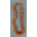 Bernsteinkette circa 74 cm lang. Amber necklace. About 74 cm long.