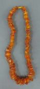 Bernsteinkette circa 74 cm lang. Amber necklace. About 74 cm long.