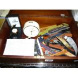 A wooden box containing an extensive collection of new and used watch straps, watches and an alarm