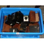 A box of old cameras to include a Coronet Consul, a 620 Kodak Brownie, a Coronet Captain and