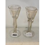 An 18th century wine glass on unusual slender multiple air twist stem with central swelling, and a