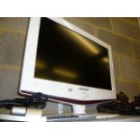 A Samsung television with remote control and wall bracket (G 8)