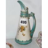 An Edwardian Royal Worcester small jug, with moulded decoration and handle picked out in pale
