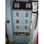 A spectacular dolls house based on an 1860 property, four stories of residential accommodation above