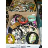 Three cartons full of great costume jewellery, beads, bangles and brooches.