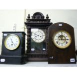 A Junghans mantel clock in ornate wood and composition case, a slate and marble mantel timepiece,