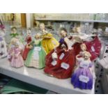 A collection of eleven Royal Doulton lady figurines… Rose HN 1368, Marie HN 1370, Tinkerbell HN