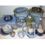 A large quantity of Wedgewood Jasperware to include planters, biscuit barrels, vases, ashtrays,