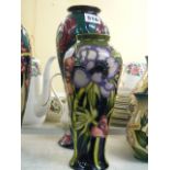 Two modern Moorcroft baluster vases, one decorated in Glasgow School style, 10.8 ins, dated 1995,