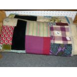 A vintage crazy quilt patchwork throw/quilt (upstairs wooden shelves)