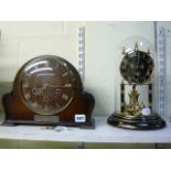 A Smith's three-train mahogany mantel clock with presentation plaque dated 1954, and a Kundo torsion