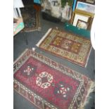 A long blue Eastern corridor rug and three small rugs (floor by Lot 7 and lot 22)