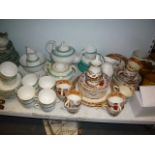 A white and green glazed 19th century Rockingham style tea service, an oriental decorated part tea