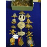 Three medals awarded to 117659 CPL.A.Stockley. R.E & a large collection of old military cap badges