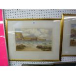 A pair of watercolours by J.W. Craddock, each signed, of rocky coastal landscapes with sailing boats